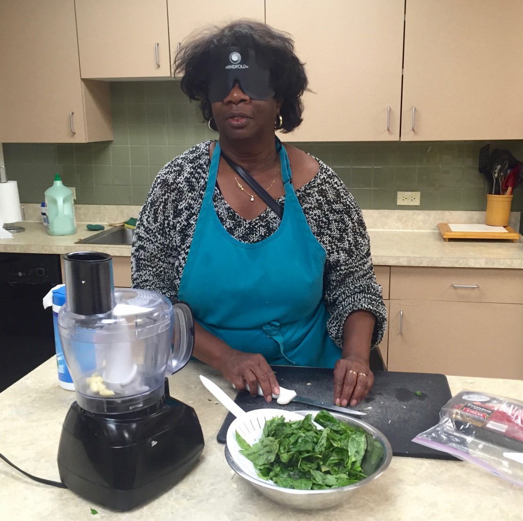 a woman prepares a salad.