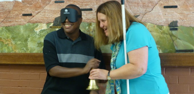 Christopher receiving the bell