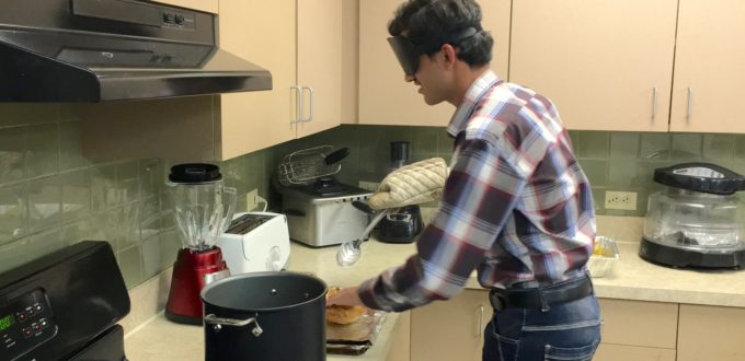 Farhan takes Somosas out of a tall pot of hot oil