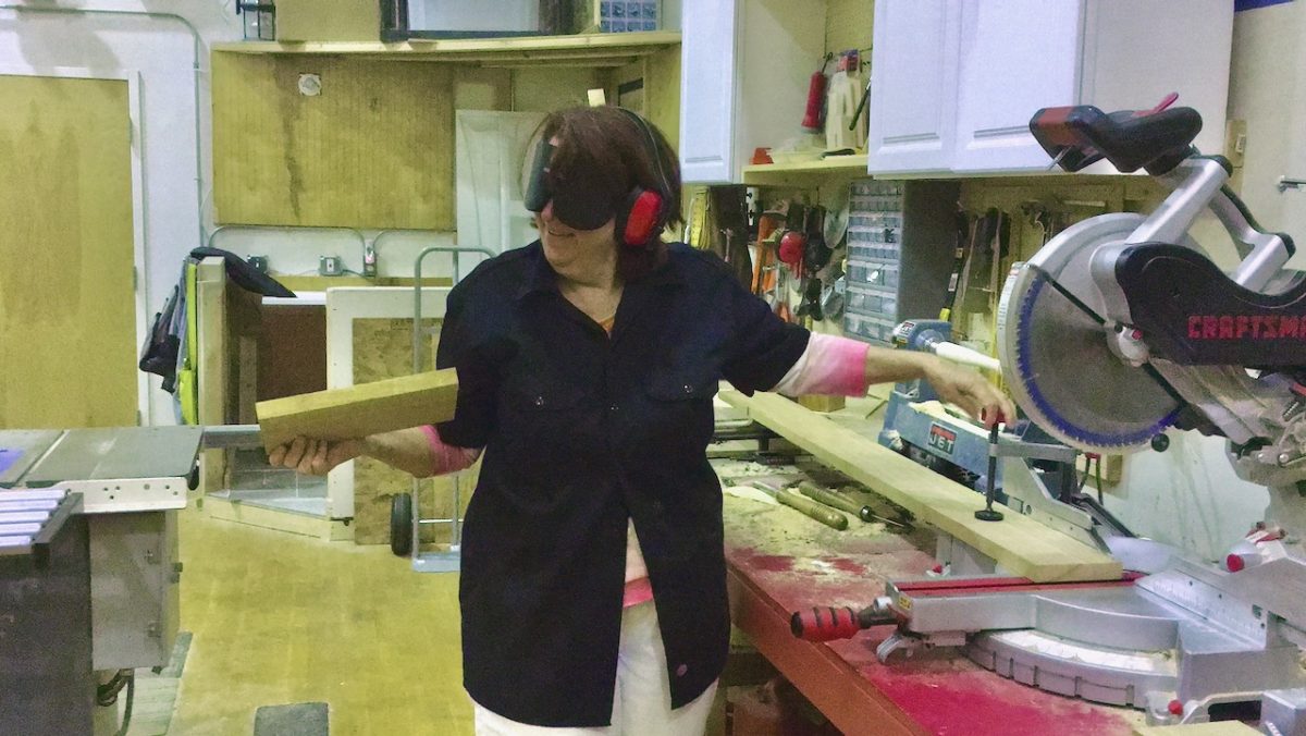 Marlene at the chop saw after her 1st cut
