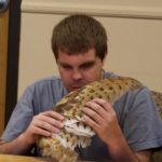 Mike looks at an Owl wing