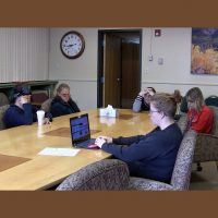 Alie quizzes the class on local bird sounds