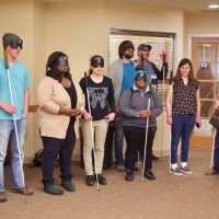 ITP Student Choir Caroling at the Senior Party