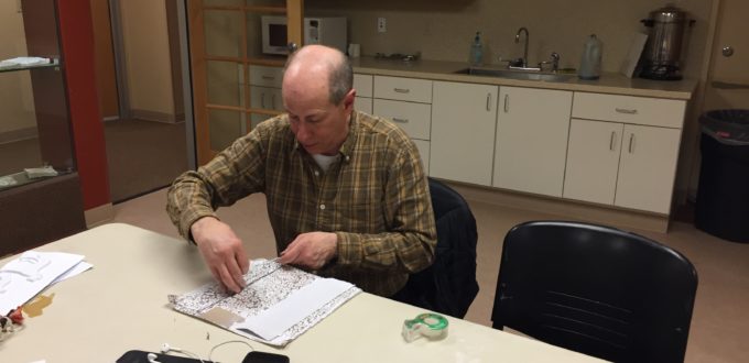 Peter exploring the paper's textures with his fingers