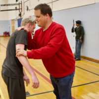David D. wards off anattacker in Martial Arts Class