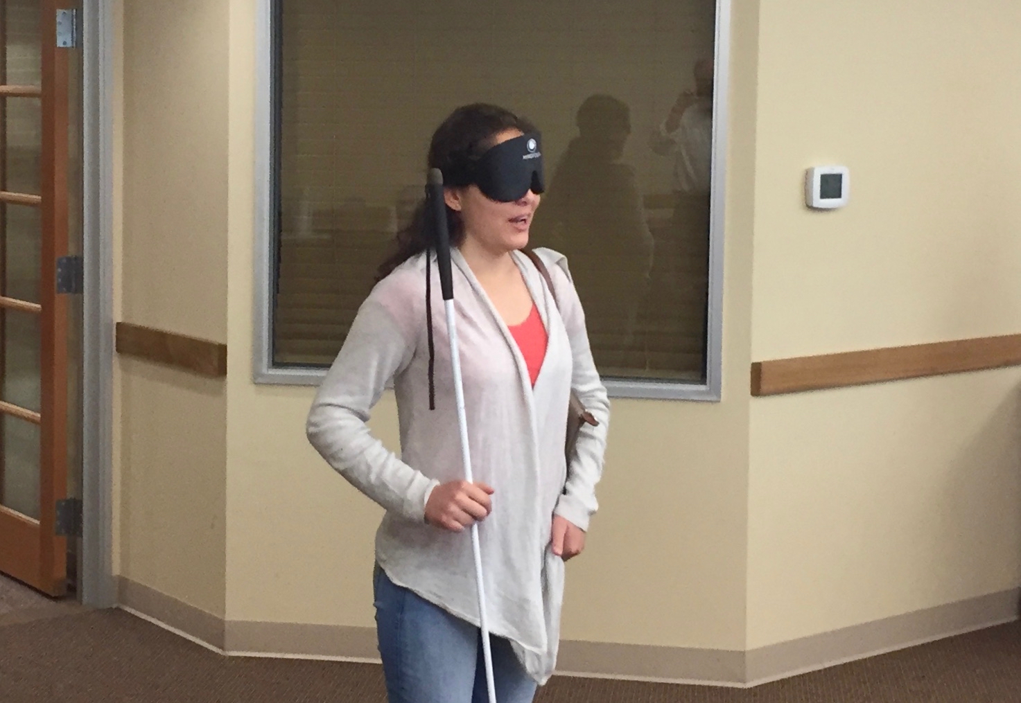 Ceci in sleepshades answering questions from visitors