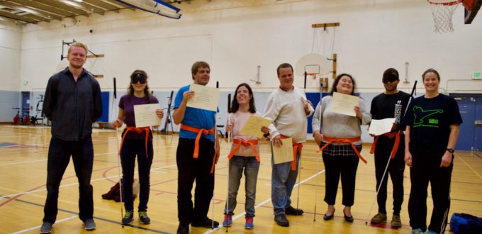 Martial Arts group - Orange Belts and Certificates - Travis, Ceci, Mike, Serena, David, Showe, Chaz and Rachael