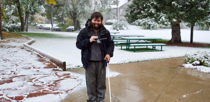 David K. walks through the snow on a winter morning