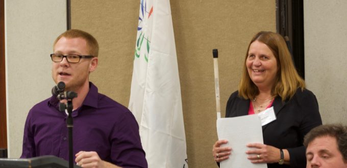 Ryan at the podium with Julie and Scott to the right at NFBCO17