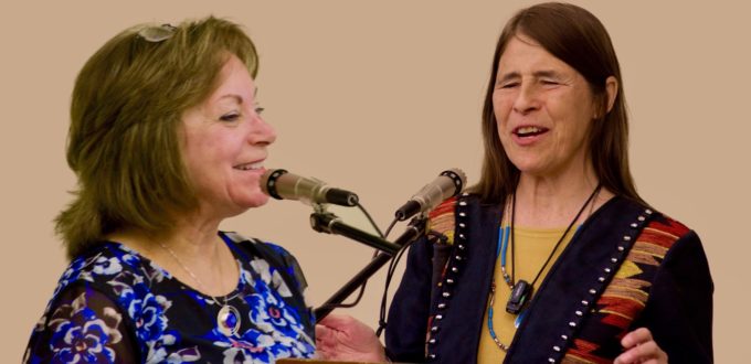 Dianne Primavera and Judy Mares-Dixon at the podium