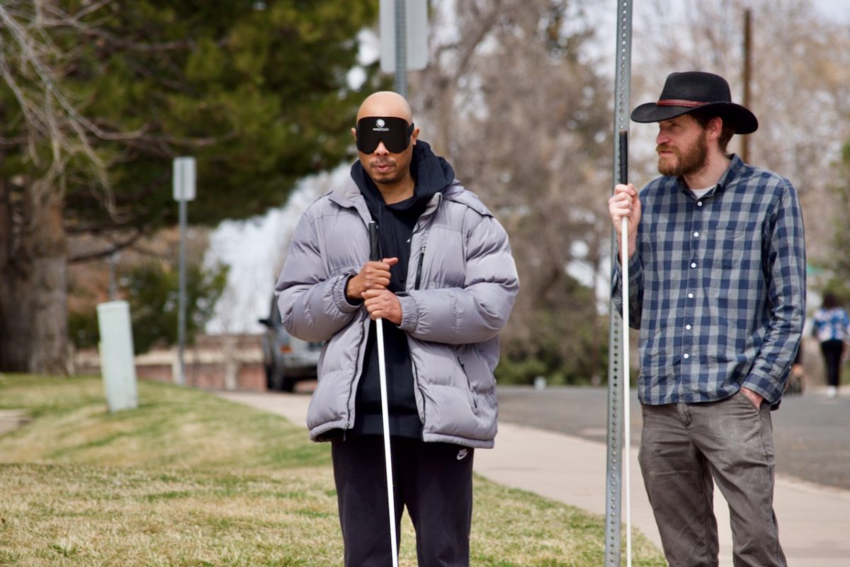 Corey and David talk about traffic sounds before making a street crossing